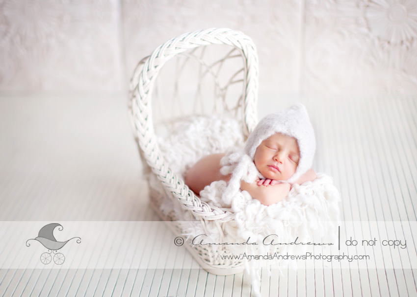 Gwen's newborn picture in bassinet 1