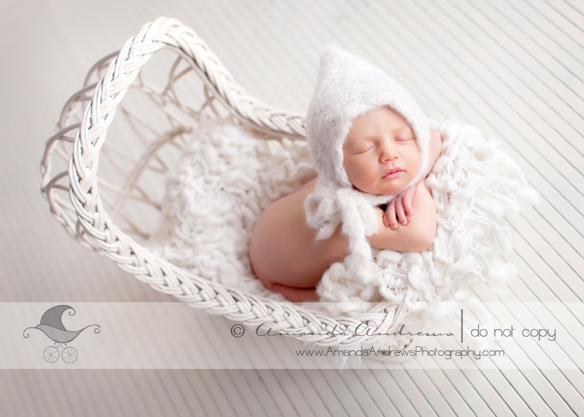 gwen's newborn photos in bassinet 3