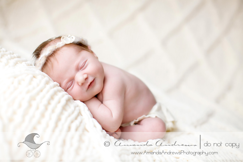 smiley newborn photograph