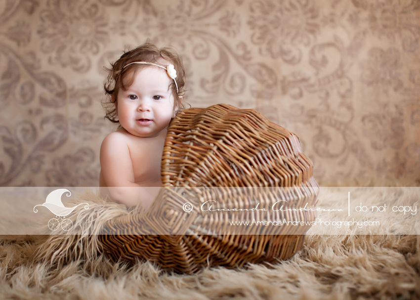 Layla 8 month old in bassinet basket baby picture
