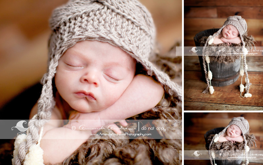 baby in basket with hat photograph