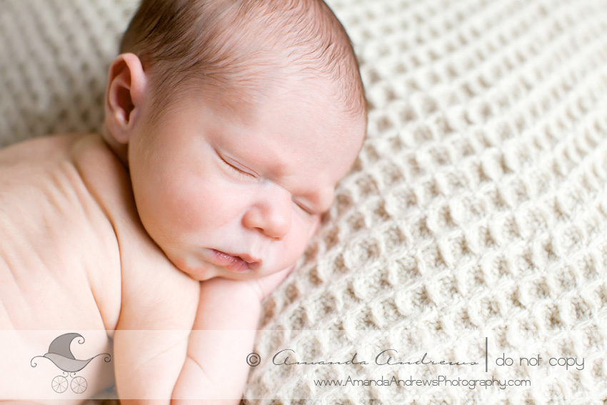 sleeping baby on cream blanket picture