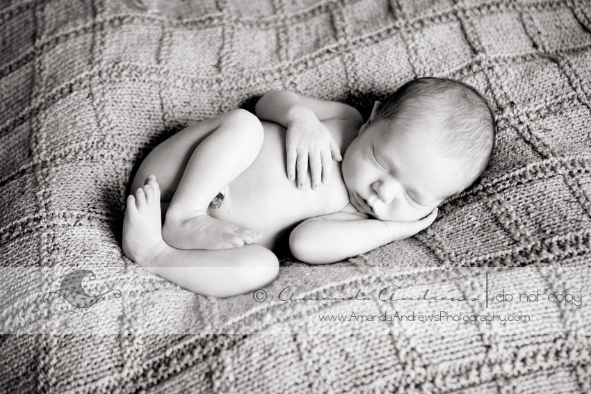 baby sleeping on grandma's blanket