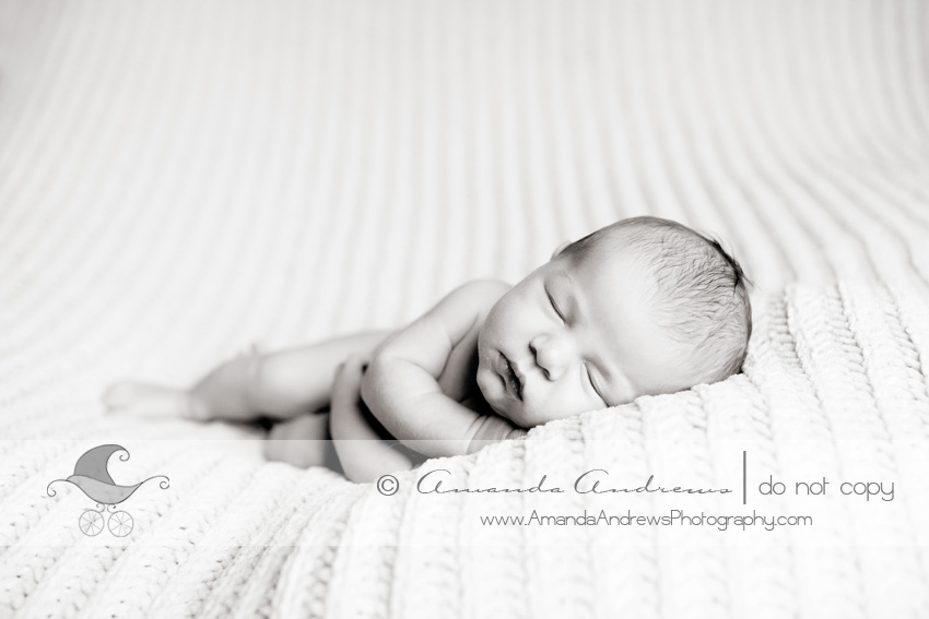 picture of baby boy on white blanket