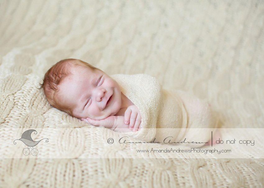 smiling baby boy redhead