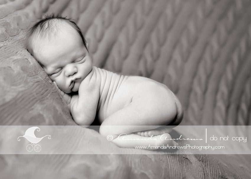 picture of baby boy on cable knit blanket