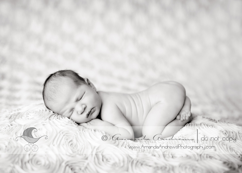 black and white photo of newborn baby girl