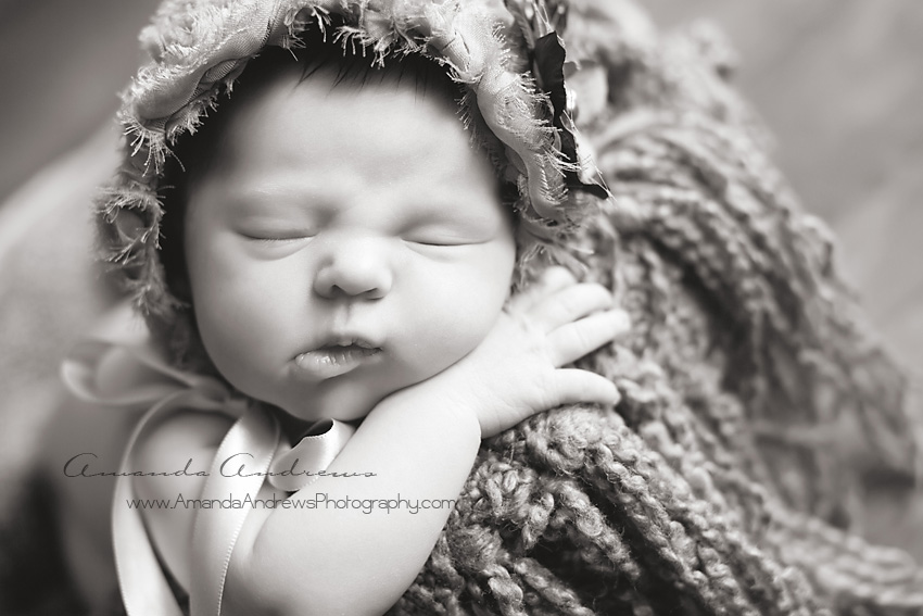 black and white photo of newborn baby