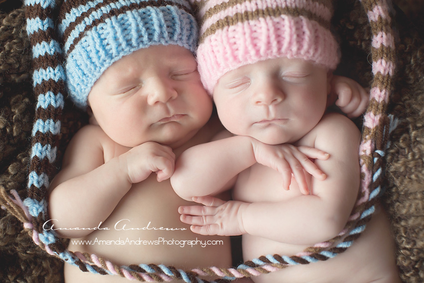 picture of twin babies with hats on
