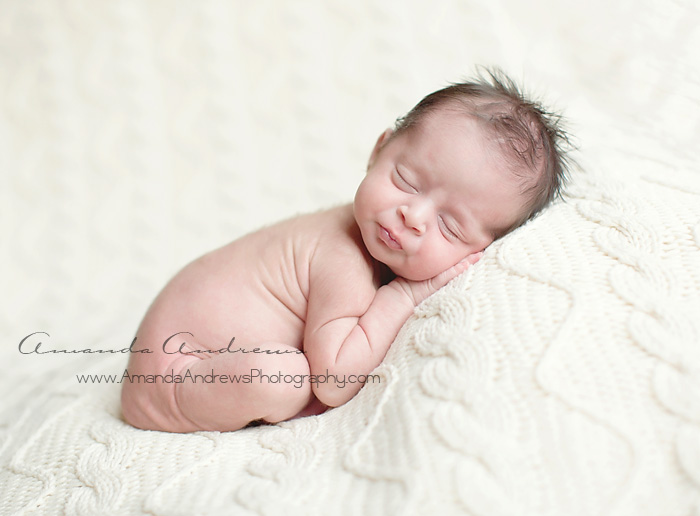 picture of baby sleeping on white blanket boise 