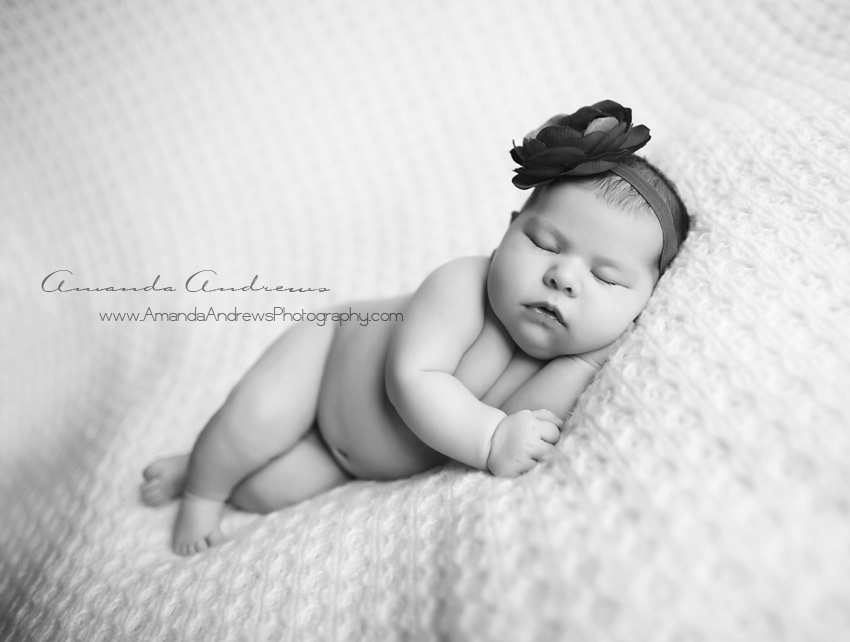black and white photo of sleeping baby