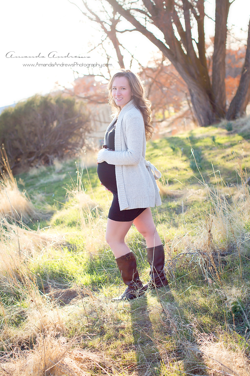 photograph of pregnant woman in field