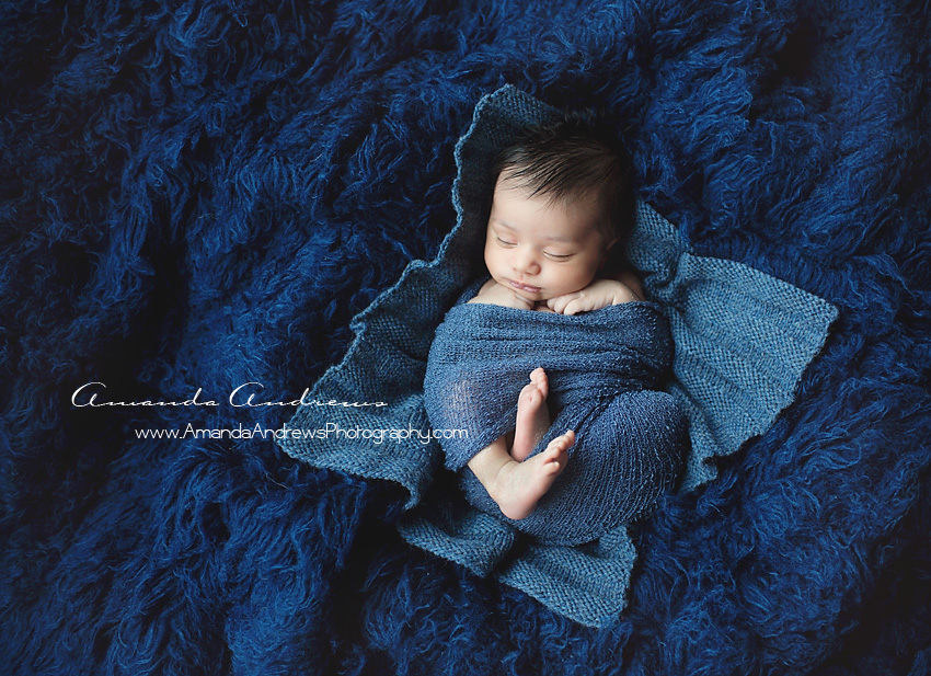 baby sleeping on blue fur blanket boise idaho