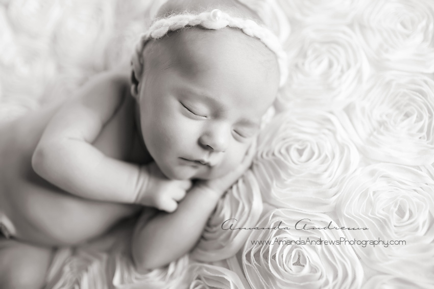 black and white image of sleeping newborn 